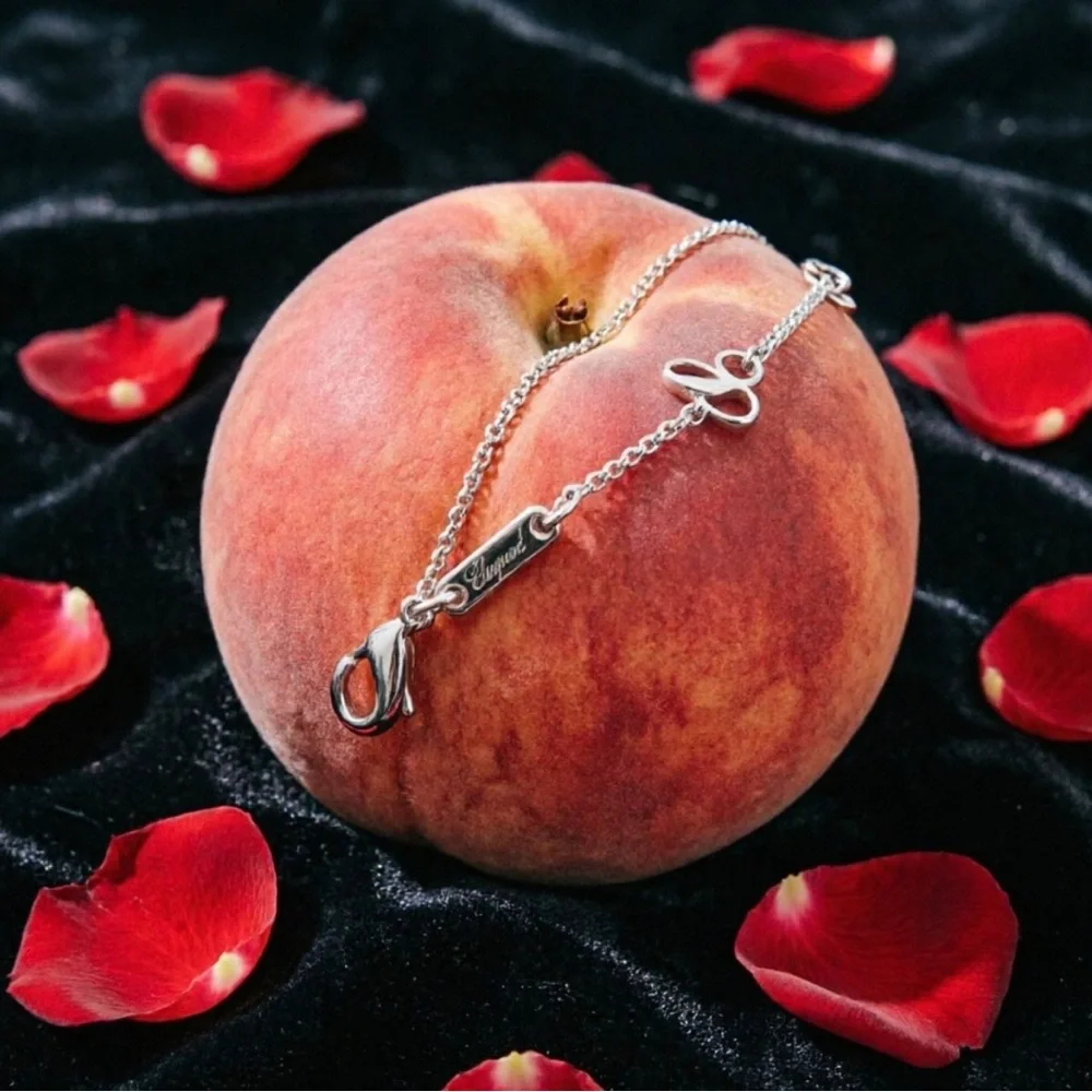 Chopard Silver Disk Necklace with Clear Diamond and Peach Accents